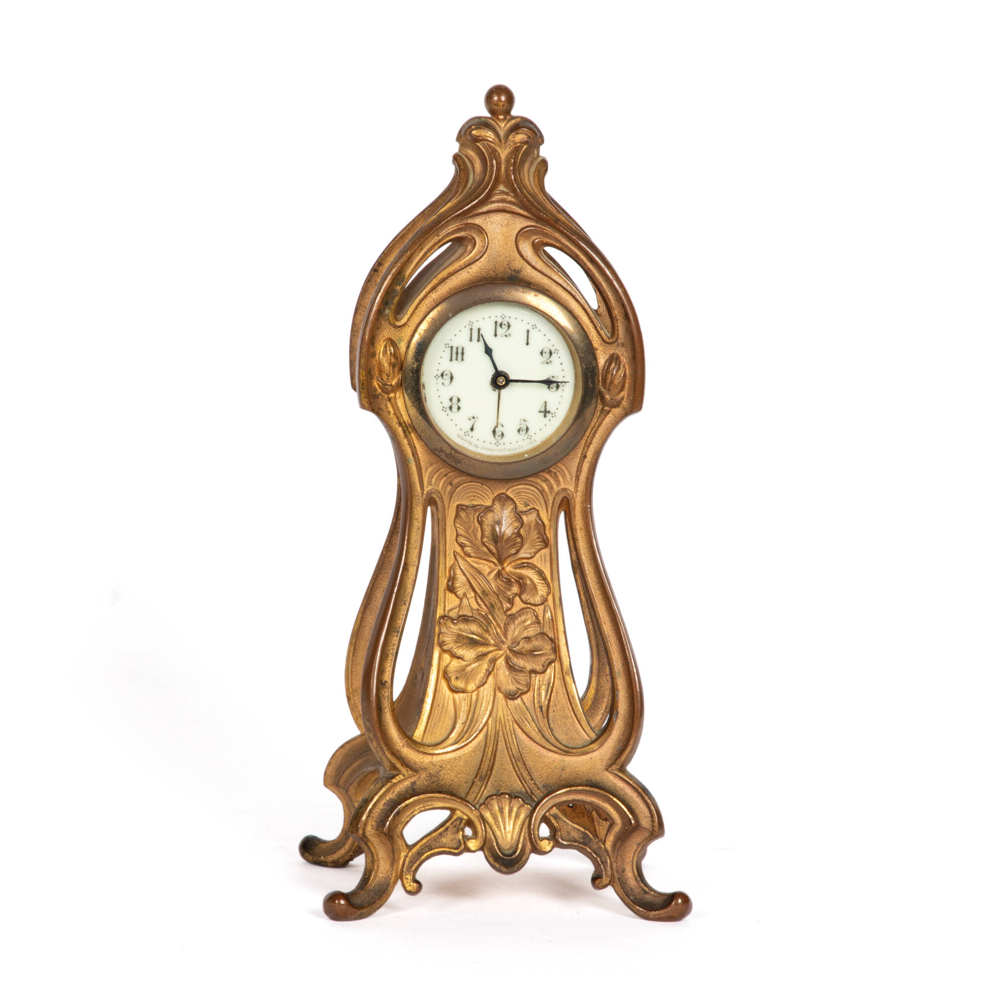 Metal, brass, and glass spelter form with a clock face in the top center.